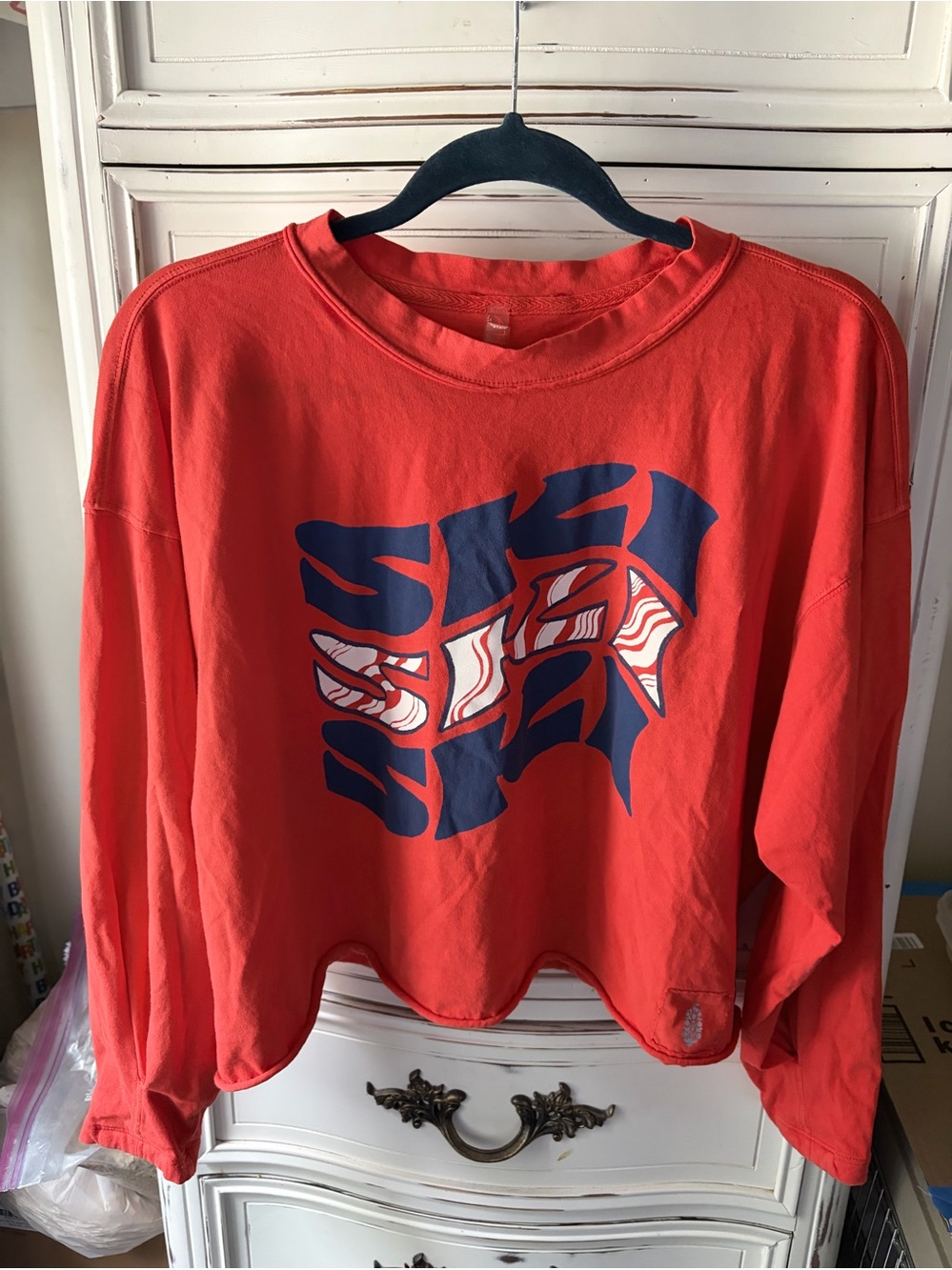 Free People Movement Orange-Red Long-sleeve Inspire Tee with “Ski” Graphic. NWOT